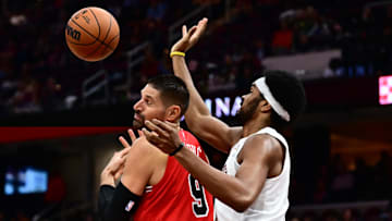 Oct 7, 2025; Cleveland, Ohio, USA; Cleveland Cavaliers center Jarrett Allen (31) knocks the ball from Chicago Bulls center Nikola Vucevic (9) during the second half at Rocket Arena. Mandatory Credit: Ken Blaze-Imagn Images
