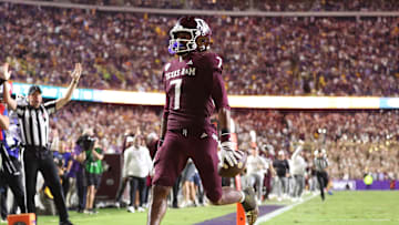 Oct 25, 2025; Baton Rouge, Louisiana, USA; Texas A&M Aggies wide receiver KC Concepcion (7) returns a punt for a touchdown during the second half against the Louisiana State Tigers at Tiger Stadium. Mandatory Credit: Stephen Lew-Imagn Images