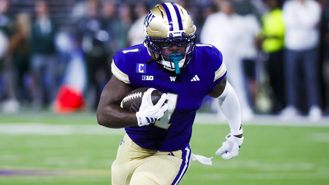 Aug 30, 2025; Seattle, Washington, USA; Washington Huskies running back Jonah Coleman (1) rushes for a touchdown against the Colorado State Rams during the first quarter at Husky Stadium. Mandatory Credit: Joe Nicholson-Imagn Images