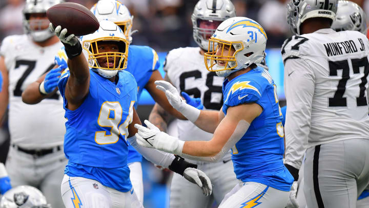 Oct 1, 2023; Inglewood, California, USA; Los Angeles Chargers linebacker Chris Rumph II (94) celebrates after recovering the ball against the Las Vegas Raiders during the first half at SoFi Stadium. Mandatory Credit: Gary A. Vasquez-USA TODAY Sports