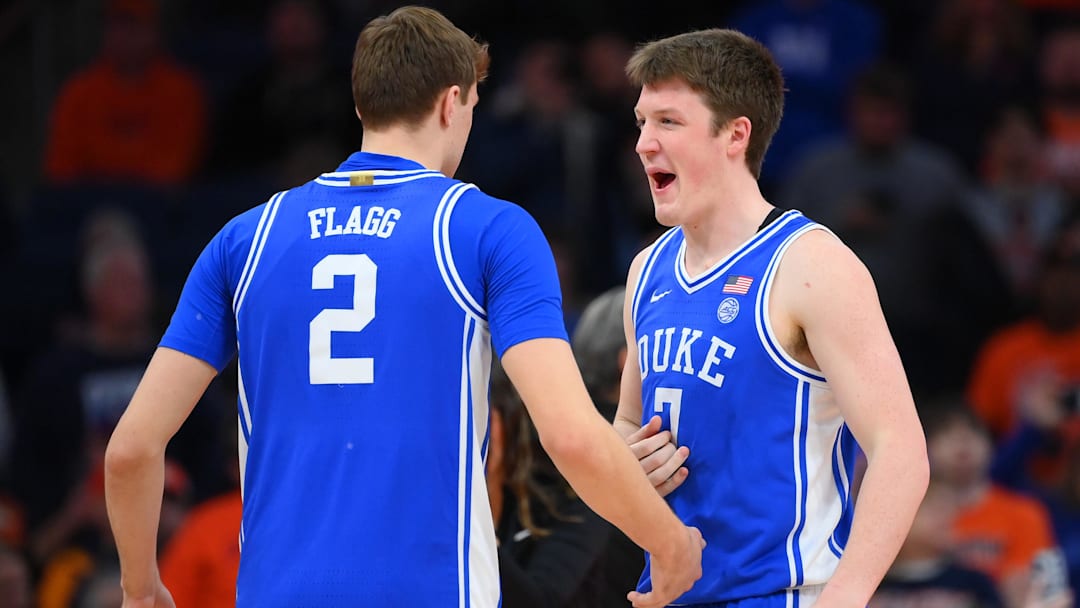 Feb 5, 2025; Syracuse, New York, USA; Duke Blue Devils guard Cooper Flagg (2) and guard Kon Knueppel (7) meet prior to the game against the Syracuse Orange at the JMA Wireless Dome. Mandatory Credit: Rich Barnes-Imagn Images