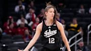 Indiana Hoosiers guard Yarden Garzon (12) celebrates scoring a three point basket Thursday, March 6, 2025, during the Big Ten women's tournament at Gainbridge Fieldhouse in Indianapolis. Indiana Hoosiers defeated the Oregon Ducks, 78-62.