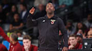 Jan 4, 2025; Atlanta, Georgia, USA; Boston College Eagles head coach Earl Grant talks to a player against the Georgia Tech Yellow Jackets in the second half at McCamish Pavilion. Mandatory Credit: Brett Davis-Imagn Images