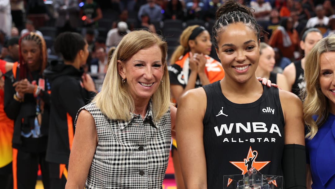 Jul 19, 2025; Indianapolis, IN, USA; Team Collier forward Napheesa Collier (24) celebrates with the trophy and commissioner Cathy Engelbert (left) after winning the 2025 WNBA All Star Game at Gainbridge Fieldhouse. Mandatory Credit: Trevor Ruszkowski-Imagn Images