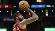 Mar 25, 2024; Cleveland, Ohio, USA; Cleveland Cavaliers forward Marcus Morris Sr. (24) shoots in the second quarter against the Charlotte Hornets at Rocket Mortgage FieldHouse. Mandatory Credit: David Richard-Imagn Images