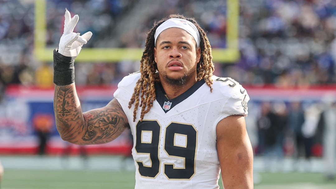 Dec 8, 2024; East Rutherford, New Jersey, USA; New Orleans Saints defensive end Chase Young (99) looks up at fans before the game against the New York Giants at MetLife Stadium. Mandatory Credit: Vincent Carchietta-Imagn Images