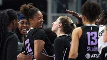 Aug 31, 2025; San Francisco, California, USA; Golden State Valkyries center Iliana Rupert (12) is congratulated by guard Kate Martin (center right) after making a three point basket against the Indiana Fever during the fourth quarter at Chase Center. Mandatory Credit: Darren Yamashita-Imagn Images