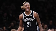 Dec 6, 2025; Brooklyn, New York, USA; Brooklyn Nets forward Noah Clowney (21) reacts after a play during the second half against the New Orleans Pelicans at Barclays Center. Mandatory Credit: Vincent Carchietta-Imagn Images