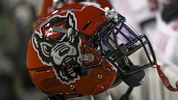 Nov 13, 2021; Winston-Salem, North Carolina, USA; A North Carolina State Wolfpack helmet seen on the sideline during the second half against the Wake Forest Demon Deacons at Truist Field. Mandatory Credit: William Howard-Imagn Images