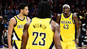 May 13, 2025; Cleveland, Ohio, USA; Indiana Pacers forward Aaron Nesmith (23) and guard Tyrese Haliburton (0) and forward Pascal Siakam (43) celebrate during the second half of game five against the Cleveland Cavaliers in the second round for the 2025 NBA Playoffs at Rocket Arena. Mandatory Credit: Ken Blaze-Imagn Images