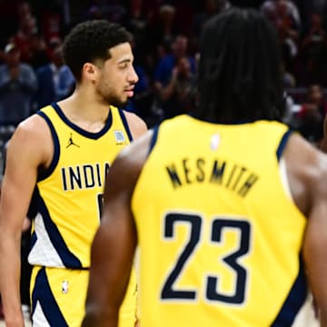 May 13, 2025; Cleveland, Ohio, USA; Indiana Pacers forward Aaron Nesmith (23) and guard Tyrese Haliburton (0) and forward Pascal Siakam (43) celebrate during the second half of game five against the Cleveland Cavaliers in the second round for the 2025 NBA Playoffs at Rocket Arena. Mandatory Credit: Ken Blaze-Imagn Images
