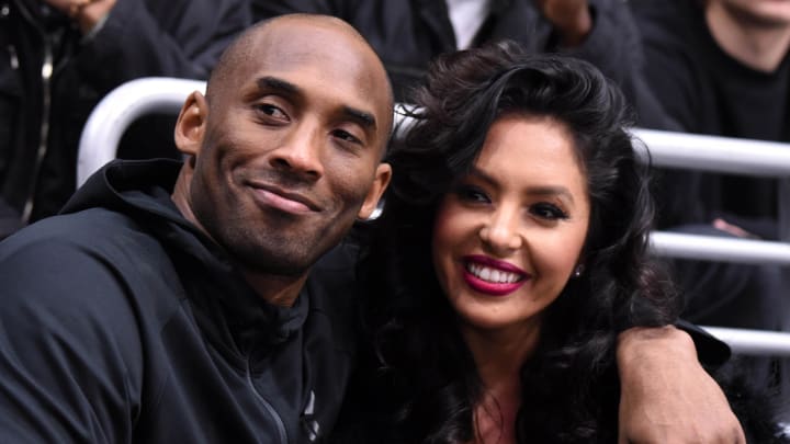 Mar 9, 2016; Los Angeles, CA, USA; Los Angeles Lakers guard Kobe Bryant (left) and wife Vanessa Bryant attend an NHL game between the Washington Capitals and the Los Angeles Kings at Staples Center.