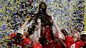 Georgia celebrates after the winning the SEC championship game against Texas in Atlanta, on Saturday, Dec. 7, 2024. Georgia won 22-19.