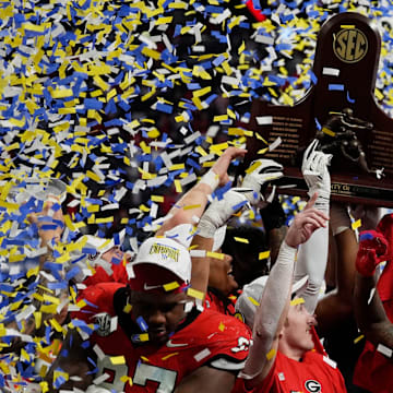 Georgia celebrates after the winning the SEC championship game against Texas in Atlanta, on Saturday, Dec. 7, 2024. Georgia won 22-19.