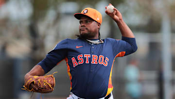 Feb 14, 2025; West Palm Beach, FL, USA; Houston Astros starting pitcher Framber Valdez (59) plays catch during a spring training workout at CACTI Park of the Palm Beaches. Mandatory Credit: Sam Navarro-Imagn Images