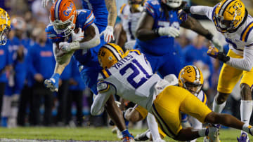 Safety Ryan Yaites (21) makes a tackle for LSU in 2023