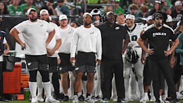 Aug 7, 2025; Philadelphia, Pennsylvania, USA; Philadelphia Eagles guard Landon Dickerson (69), running back Saquon Barkley (26) and head coach Nick Sirianni on the sidelines against the Cincinnati Bengals during the second quarter at Lincoln Financial Field. Mandatory Credit: Eric Hartline-Imagn Images