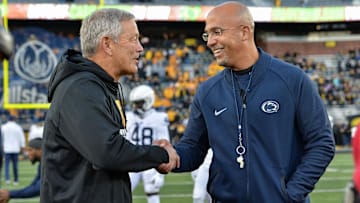 Oct 12, 2019; Iowa City, IA, USA; Penn State Nittany Lions head coach James Franklin (left) and Iowa Hawkeyes head coach Kirk Ferentz (right) shake hands before the game at Kinnick Stadium. Mandatory Credit: Jeffrey Becker-Imagn Images