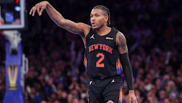 Nov 28, 2025; New York, New York, USA; New York Knicks guard Miles McBride (2) reacts after making a three point basket during the second half against the Milwaukee Bucks at Madison Square Garden. Mandatory Credit: Vincent Carchietta-Imagn Images