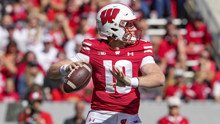 Sep 7, 2024; Madison, Wisconsin, USA;  Wisconsin Badgers quarterback Tyler Van Dyke (10) throws a pass during the second quarter against the South Dakota Coyotes at Camp Randall Stadium. Mandatory Credit: Jeff Hanisch-Imagn Images