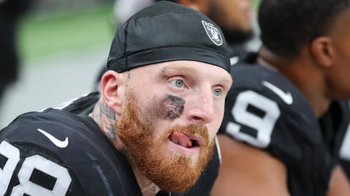 Sep 28, 2025; Paradise, Nevada, USA; Las Vegas Raiders defensive end Maxx Crosby (98) looks on from the sideline during the first quarter against the Chicago Bears at Allegiant Stadium. Mandatory Credit: Kiyoshi Mio-Imagn Images