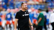 Sep 6, 2025; Gainesville, Florida, USA; South Florida Bulls head coach Alex Golesh smiles before a game against the Florida Gators at Ben Hill Griffin Stadium. Mandatory Credit: Matt Pendleton-Imagn Images
