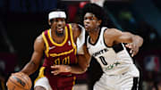 Feb 20, 2022; Cleveland, OH, USA; Cleveland Charge guard Malik Newman (14) brings the ball up court against G League Ignite guard Scoot Henderson (0) during the first half of the NBA G League Next Gem Game at the Wolstein Center. Mandatory Credit: Ken Blaze-Imagn Images

