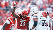 Louisville Cardinals defensive lineman Wesley Bailey (23) had a stop on Bowling Green Falcons wide receiver Allen Middleton (1) in the first half against Bowling Green at L&N Federal Credit Union Stadium in Louisville, Kentucky Sept. 20, 2025.