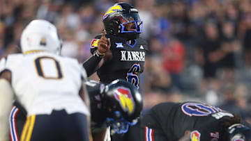 Kansas Jayhawks quarterback Jalon Daniels (6) yells out calls during the second half of the game against West Virginia Mountaineers at David Booth Kansas Memorial Stadium on Sept. 20, 2025.