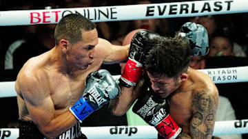 Juan Francisco Estrada throws a punch at Jesse ‘Bam’ Rodriguez during the Matchroom Boxing Main Event at the Footprint Center on June 29, 2024, in Phoenix.