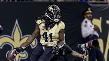 Sep 7, 2025; New Orleans, Louisiana, USA; New Orleans Saints running back Alvin Kamara (41) scores a touch down during the second quarter at Caesars Superdome. Mandatory Credit: Stephen Lew-Imagn Images