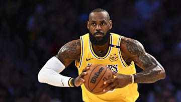 Apr 11, 2025; Los Angeles, California, USA; Los Angeles Lakers forward LeBron James (23) passes against the Houston Rockets during the first half at Crypto.com Arena. Mandatory Credit: Jonathan Hui-Imagn Images