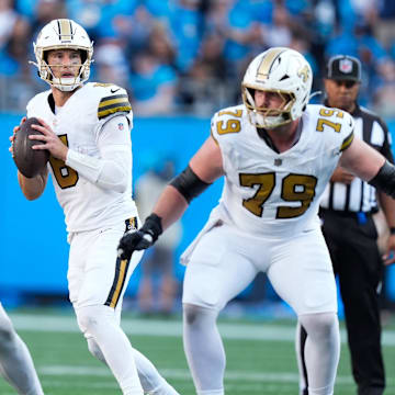 Nov 9, 2025; Charlotte, North Carolina, USA; New Orleans Saints quarterback Tyler Shough (6) looks to pass during the fourth quarter against the Carolina Panthers at Bank of America Stadium. Mandatory Credit: Jim Dedmon-Imagn Images