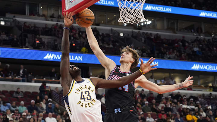 Dec 5, 2025; Chicago, Illinois, USA; Chicago Bulls forward Matas Buzelis (14) blocks the shot of Indiana Pacers forward Pascal Siakam (43) during the first half at United Center. Mandatory Credit: David Banks-Imagn Images