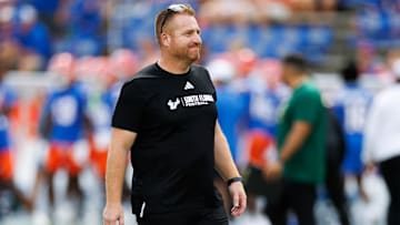 Sep 6, 2025; Gainesville, Florida, USA; South Florida Bulls head coach Alex Golesh smiles before a game against the Florida Gators at Ben Hill Griffin Stadium. Mandatory Credit: Matt Pendleton-Imagn Images