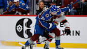 Oct 27, 2024; Denver, Colorado, USA; Colorado Avalanche center Matt Stienburg (36) and Ottawa Senators defenseman Nick Jensen (3) battle for the puck in the second period at Ball Arena. Mandatory Credit: Isaiah J. Downing-Imagn Images