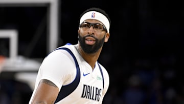 Oct 6, 2025; Fort Worth, Texas, USA; Dallas Mavericks forward/center Anthony Davis (3) looks to move the ball past Oklahoma City Thunder guard Cason Wallace (22) during the first quarter at Dickie's Arena. Mandatory Credit: Jerome Miron-Imagn Images