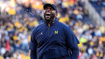 Michigan head coach Sherrone Moore fires up the student section during warm up ahead of the New Mexico game at Michigan Stadium in Ann Arbor on Saturday, August 30, 2025.