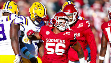Oklahoma defensive tackle Gracen Halton celebrates after making a play against LSU.