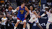 May 9, 2025; Denver, Colorado, USA; Oklahoma City Thunder forward Jaylin Williams (6) defends on Denver Nuggets center Nikola Jokic (15) in the first half during game three of the second round for the 2025 NBA Playoffs at Ball Arena. Mandatory Credit: Ron Chenoy-Imagn Images
