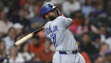 Apr 22, 2025; Houston, Texas, USA; Toronto Blue Jays designated hitter Vladimir Guerrero Jr. (27) bats during the sixth inning against the Houston Astros at Daikin Park. 