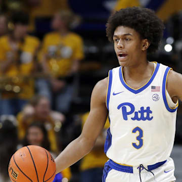 Nov 15, 2024; Pittsburgh, Pennsylvania, USA;  Pittsburgh Panthers guard Brandin Cummings (3) dribbles the ball against the West Virginia Mountaineers during the second half at the Petersen Events Center. Mandatory Credit: Charles LeClaire-Imagn Images