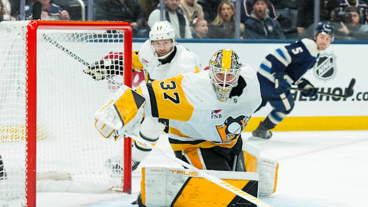 Jan 4, 2026; Columbus, Ohio, USA;  Pittsburgh Penguins goaltender Arturs Silovs (37) makes a save in net against the Columbus Blue Jackets in the first period at Nationwide Arena. Mandatory Credit: Aaron Doster-Imagn Images