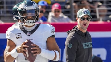 Philadelphia Eagles quarterback Jalen Hurts (1) and head coach Nick Sirianni pregame against the New York Giants at MetLife Stadium.