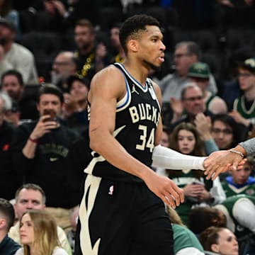 Apr 27, 2025; Milwaukee, Wisconsin, USA; Milwaukee Bucks forward Giannis Antetokounmpo (34) exits the game in the fourth quarter as head coach Doc Rivers shakes his hand during game four against the Indiana Pacers of first round for the 2024 NBA Playoffs at Fiserv Forum. Mandatory Credit: Benny Sieu-Imagn Images