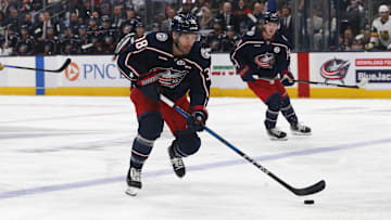 Mar 13, 2025; Columbus, Ohio, USA; Columbus Blue Jackets center Boone Jenner (38) carries the puck against the Vegas Golden Knights during the first period at Nationwide Arena. Mandatory Credit: Russell LaBounty-Imagn Images