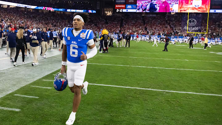 Jan 8, 2026; Glendale, AZ, USA; Mississippi Rebels quarterback Trinidad Chambliss (6) against the Miami Hurricanes during the 2026 Fiesta Bowl and semifinal game of the College Football Playoff at State Farm Stadium. Mandatory Credit: Mark J. Rebilas-Imagn Images