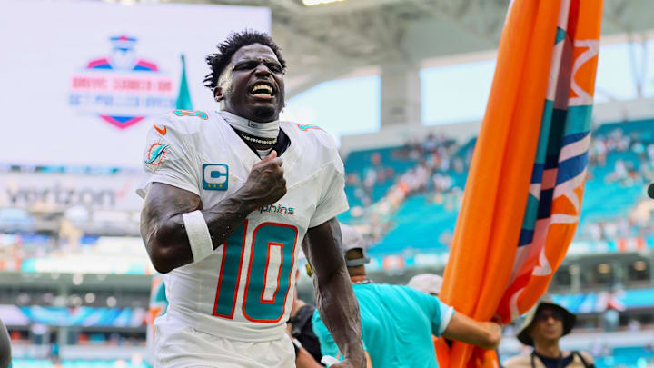 Tyreek Hill celebrated the Dolphins’ season-opening win.