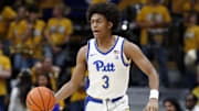 Nov 15, 2024; Pittsburgh, Pennsylvania, USA;  Pittsburgh Panthers guard Brandin Cummings (3) dribbles the ball against the West Virginia Mountaineers during the second half at the Petersen Events Center. Mandatory Credit: Charles LeClaire-Imagn Images