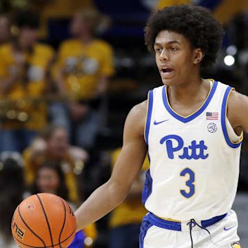 Nov 15, 2024; Pittsburgh, Pennsylvania, USA;  Pittsburgh Panthers guard Brandin Cummings (3) dribbles the ball against the West Virginia Mountaineers during the second half at the Petersen Events Center. Mandatory Credit: Charles LeClaire-Imagn Images